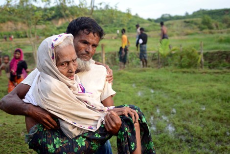 Fear and Fire Send Rohingya Fleeing to Bangladesh